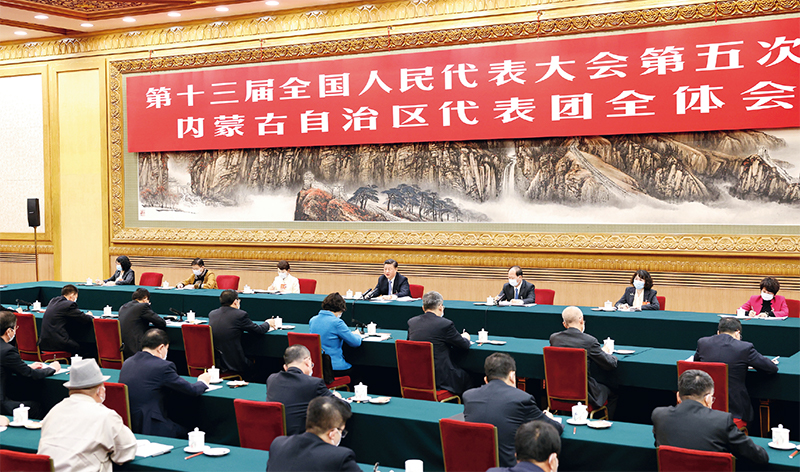 习近平：新时代党和人民奋进的必由之路